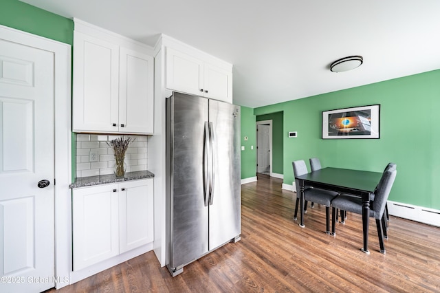 107 Frederick Ave, Colonie, NY 12205 - kitchen with freestanding refrigerator, dark wood-style floors, white cabinets, backsplash, and dark stone counters