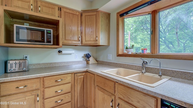 324 Elsmere Ave, Bethlehem, NY 12054 - kitchen with stainless steel microwave and light countertops