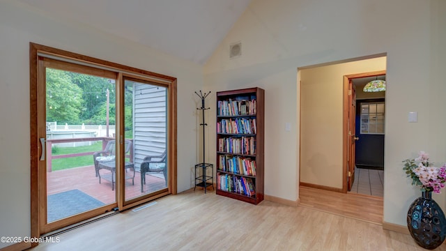 324 Elsmere Ave, Bethlehem, NY 12054 - living area featuring wood finished floors and high vaulted ceiling