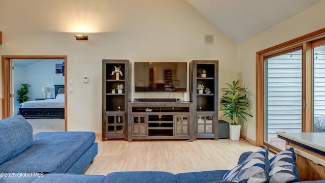 324 Elsmere Ave, Bethlehem, NY 12054 - living room with high vaulted ceiling and wood finished floors