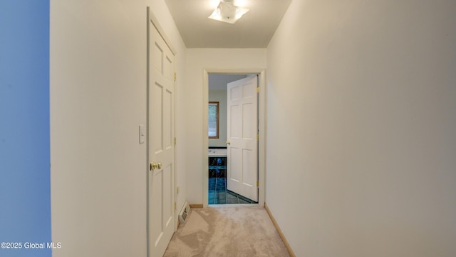 324 Elsmere Ave, Bethlehem, NY 12054 - corridor featuring carpet floors and baseboards