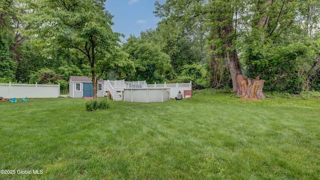 324 Elsmere Ave, Bethlehem, NY 12054 - view of yard with a shed and an outdoor pool