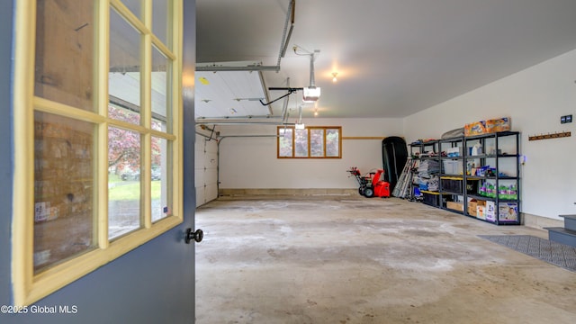 324 Elsmere Ave, Bethlehem, NY 12054 - garage with a garage door opener