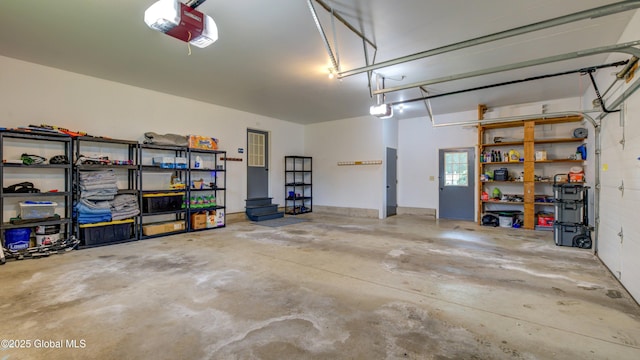 324 Elsmere Ave, Bethlehem, NY 12054 - garage featuring a garage door opener