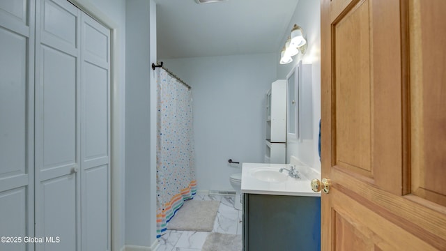 324 Elsmere Ave, Bethlehem, NY 12054 - full bath with vanity, marble look tile flooring, a closet, and a shower with shower curtain