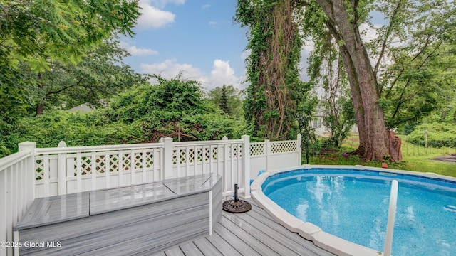 324 Elsmere Ave, Bethlehem, NY 12054 - outdoor pool featuring a wooden deck