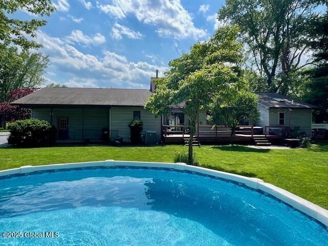 324 Elsmere Ave, Bethlehem, NY 12054 - swimming pool with a yard and a deck