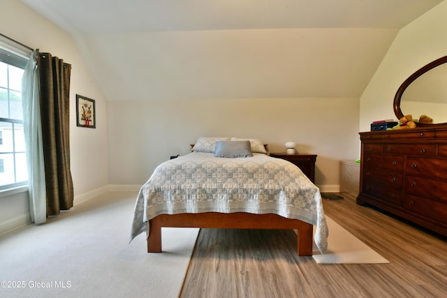16 Anthony Pl, Ballston, NY 12020 - bedroom with vaulted ceiling, multiple windows, and light wood finished floors