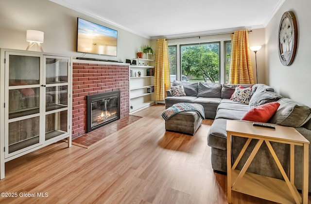 17 Malpass Rd, Guilderland, NY 12203 - living area with crown molding, wood finished floors, and a fireplace