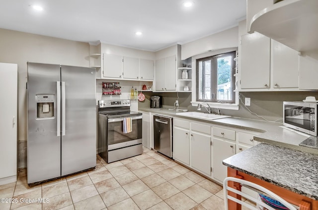 17 Malpass Rd, Guilderland, NY 12203 - kitchen with stainless steel appliances, open shelves, white cabinets, light tile patterned flooring, and recessed lighting