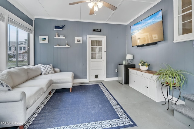 17 Malpass Rd, Guilderland, NY 12203 - living room with crown molding, concrete floors, and a ceiling fan