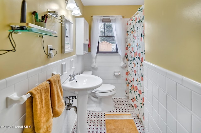 17 Malpass Rd, Guilderland, NY 12203 - full bath with a wainscoted wall, a shower with shower curtain, and tile walls