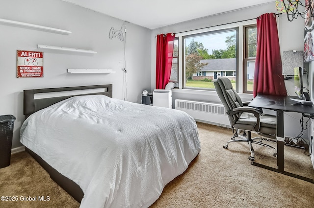 17 Malpass Rd, Guilderland, NY 12203 - bedroom featuring radiator, carpet floors, and a desk