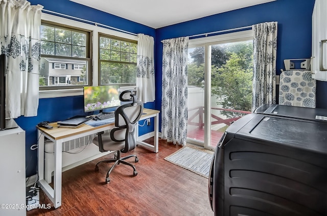 17 Malpass Rd, Guilderland, NY 12203 - office area with wood finished floors, washing machine and clothes dryer, and healthy amount of natural light