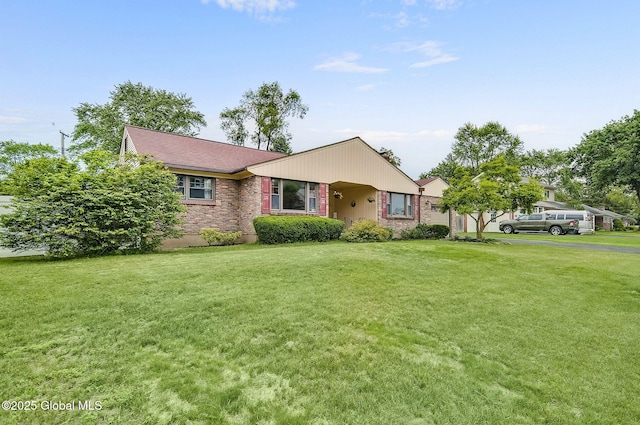 17 Malpass Rd, Guilderland, NY 12203 - view of front of home with a front yard and brick siding