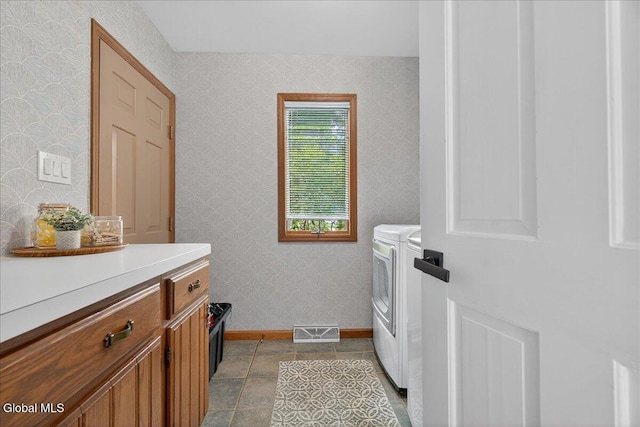1 Fox Run, Colonie, NY 12110 - laundry area featuring washer and clothes dryer, wallpapered walls, and cabinet space