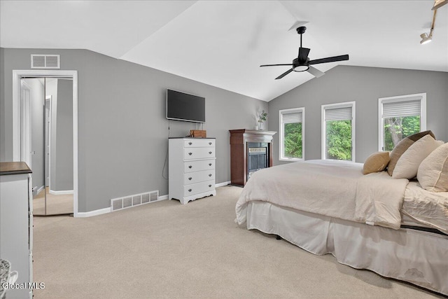 1 Fox Run, Colonie, NY 12110 - bedroom featuring carpet, vaulted ceiling, a fireplace, and ceiling fan