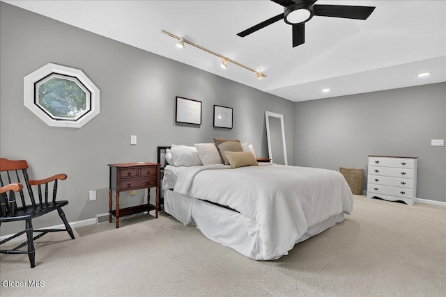 1 Fox Run, Colonie, NY 12110 - bedroom with light colored carpet, vaulted ceiling, track lighting, a ceiling fan, and recessed lighting