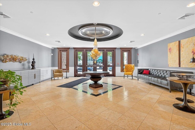 70 Railroad Pl Unit 207, Saratoga Springs, NY 12866 - community lobby with crown molding, recessed lighting, a wainscoted wall, and a decorative wall