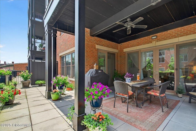 70 Railroad Pl Unit 207, Saratoga Springs, NY 12866 - view of patio / terrace with ceiling fan and a grill