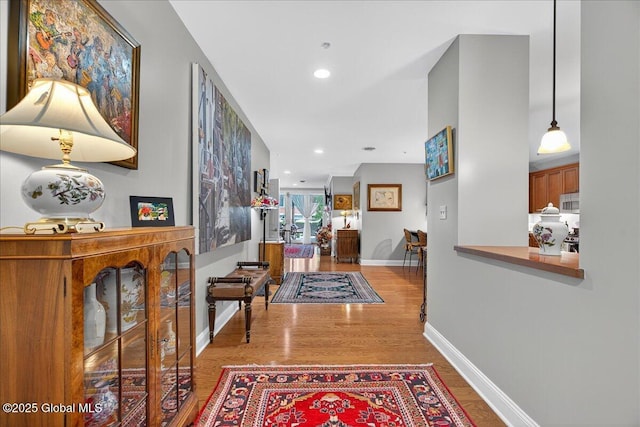 70 Railroad Pl Unit 207, Saratoga Springs, NY 12866 - hallway with wood finished floors and recessed lighting