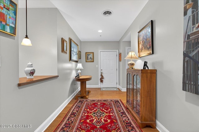70 Railroad Pl Unit 207, Saratoga Springs, NY 12866 - hall with wood finished floors and recessed lighting