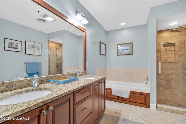 70 Railroad Pl Unit 207, Saratoga Springs, NY 12866 - full bath featuring a shower stall, a bath, double vanity, and tile patterned floors
