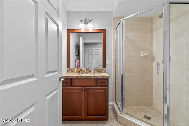 70 Railroad Pl Unit 207, Saratoga Springs, NY 12866 - full bath featuring vanity, a stall shower, and tile patterned floors