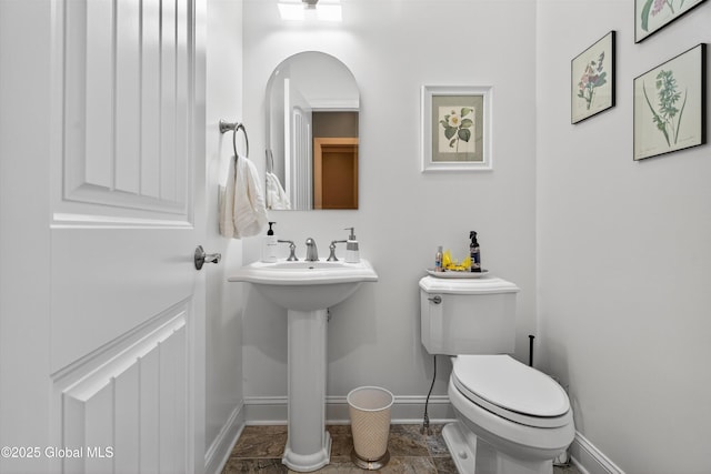 6 Corinne Ct, Saratoga, NY 12866 - bathroom with baseboards and toilet