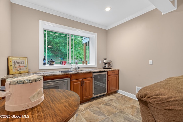 6 Corinne Ct, Saratoga, NY 12866 - indoor wet bar featuring wine cooler, stainless steel microwave, crown molding, recessed lighting, and light stone finish flooring