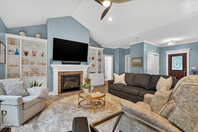 6 Corinne Ct, Saratoga, NY 12866 - living room with vaulted ceiling, ceiling fan, a glass covered fireplace, and crown molding