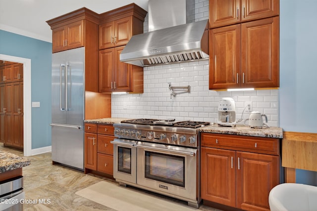 6 Corinne Ct, Saratoga, NY 12866 - kitchen featuring premium appliances, wall chimney exhaust hood, light stone countertops, backsplash, and crown molding