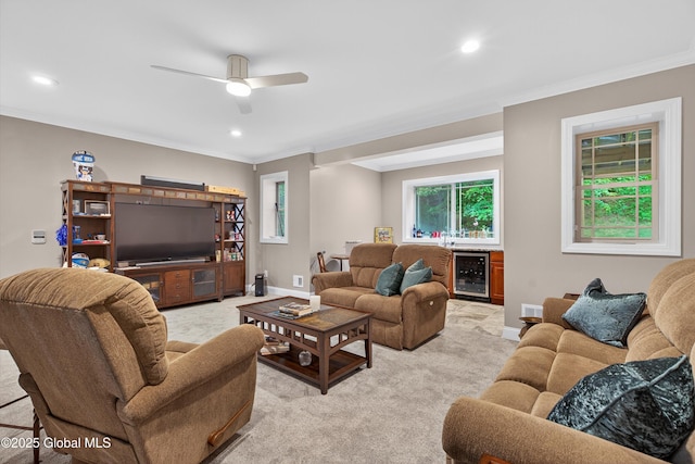 6 Corinne Ct, Saratoga, NY 12866 - living room with wine cooler, light colored carpet, ornamental molding, recessed lighting, and ceiling fan