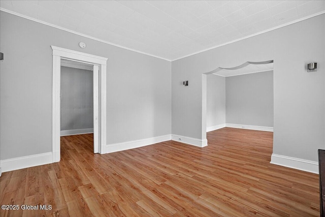 329 E Main St, Amsterdam, NY 12010 - empty room featuring crown molding, wood finished floors, and a smoke detector