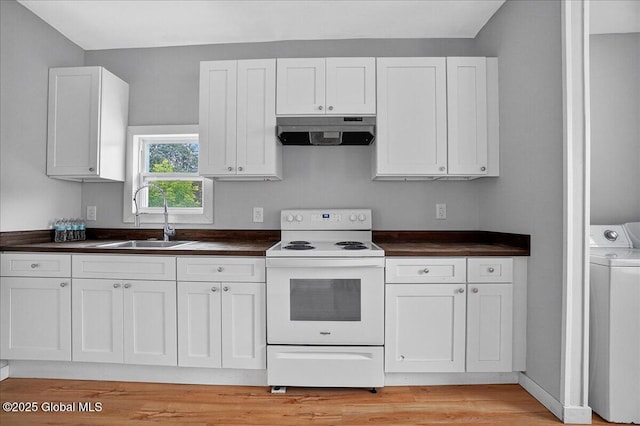 329 E Main St, Amsterdam, NY 12010 - kitchen with electric stove, under cabinet range hood, dark countertops, light wood-type flooring, and white cabinetry