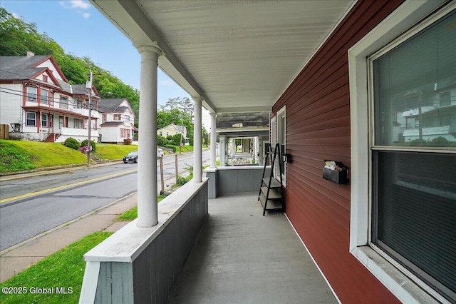 329 E Main St, Amsterdam, NY 12010 - porch with a residential view
