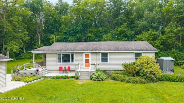 585 Logtown Rd, Glen, NY 12072 - view of front of property featuring a storage shed, a front yard, and a view of trees