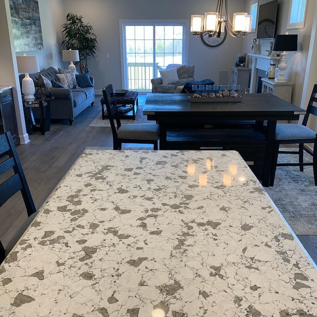 1E Brison St, North Greenbush, NY 12180 - dining area with a chandelier and dark wood finished floors