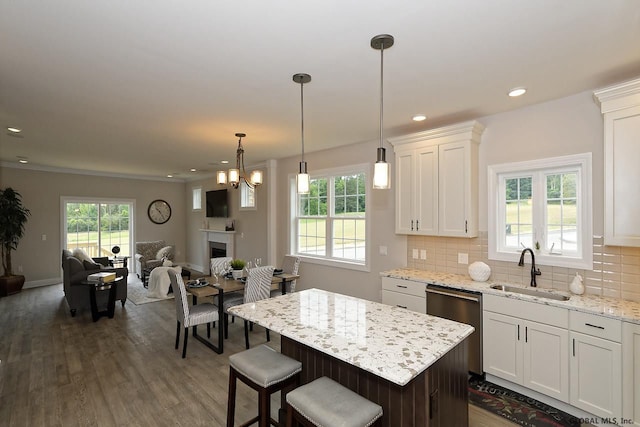 1E Brison St, North Greenbush, NY 12180 - kitchen featuring dishwasher, white cabinetry, dark wood-style floors, backsplash, and recessed lighting
