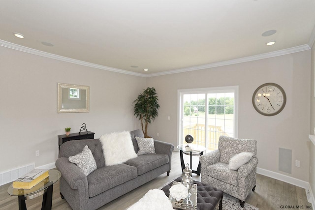 1E Brison St, North Greenbush, NY 12180 - living area featuring wood finished floors, crown molding, and recessed lighting