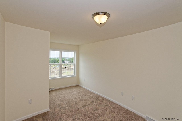 1E Brison St, North Greenbush, NY 12180 - carpeted empty room featuring baseboards