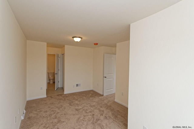 1E Brison St, North Greenbush, NY 12180 - empty room with light colored carpet and baseboards