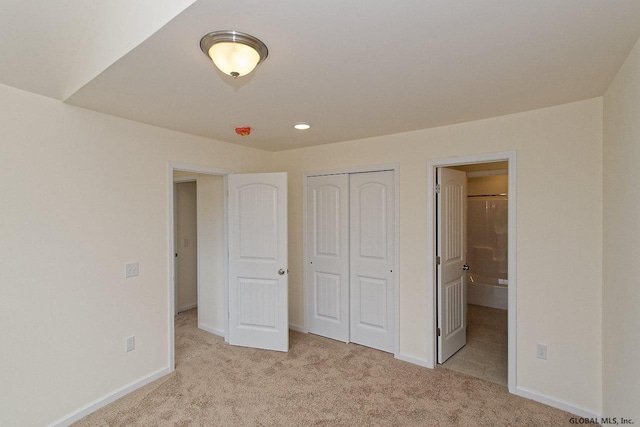 1E Brison St, North Greenbush, NY 12180 - unfurnished bedroom featuring carpet, a closet, ensuite bathroom, and recessed lighting