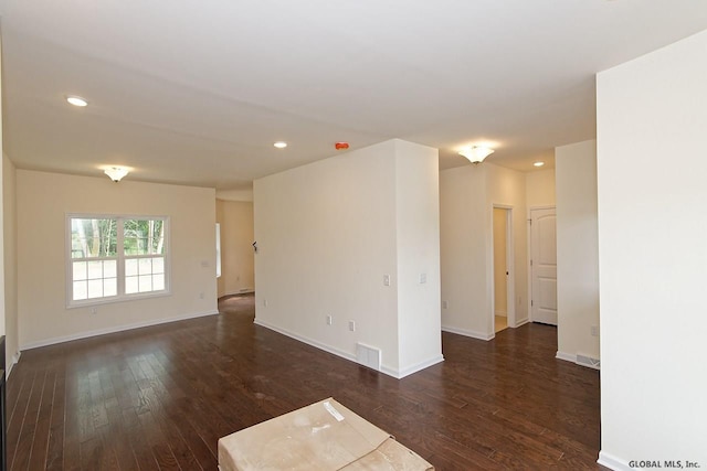 1E Brison St, North Greenbush, NY 12180 - spare room featuring dark wood-style floors and recessed lighting