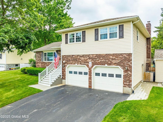 34 Aspen Rd, Colonie, NY 12110 - split level home with a garage, driveway, a front lawn, a chimney, and brick siding