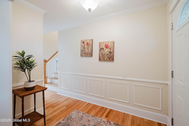 34 Aspen Rd, Colonie, NY 12110 - corridor with ornamental molding, light wood finished floors, and stairs