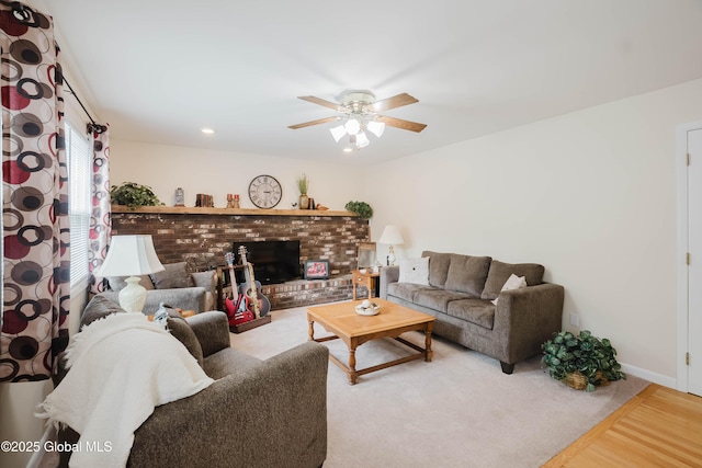 34 Aspen Rd, Colonie, NY 12110 - living room with a ceiling fan, a brick fireplace, and recessed lighting