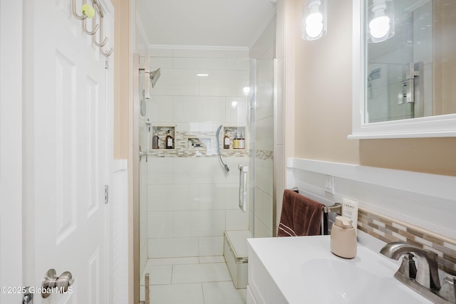 34 Aspen Rd, Colonie, NY 12110 - full bath featuring a stall shower, ornamental molding, tile patterned floors, vanity, and tile walls