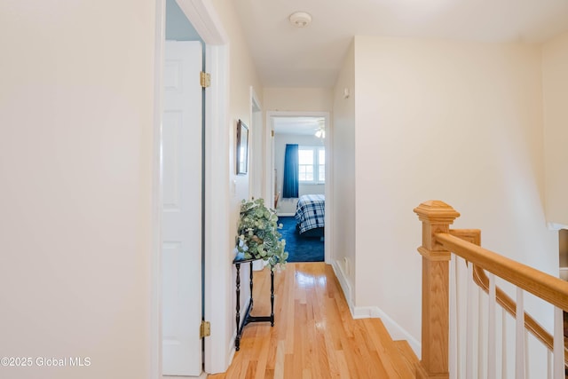 34 Aspen Rd, Colonie, NY 12110 - corridor with an upstairs landing and light wood-style flooring