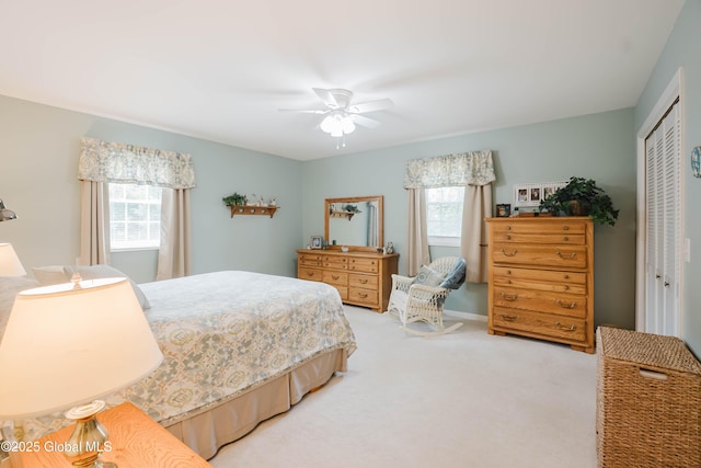 34 Aspen Rd, Colonie, NY 12110 - bedroom featuring light carpet, a closet, and ceiling fan